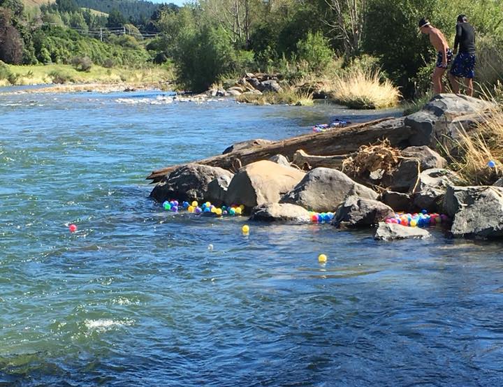 Thousands of play balls in Waikanae River